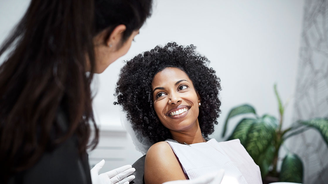 Smiling patient in chair